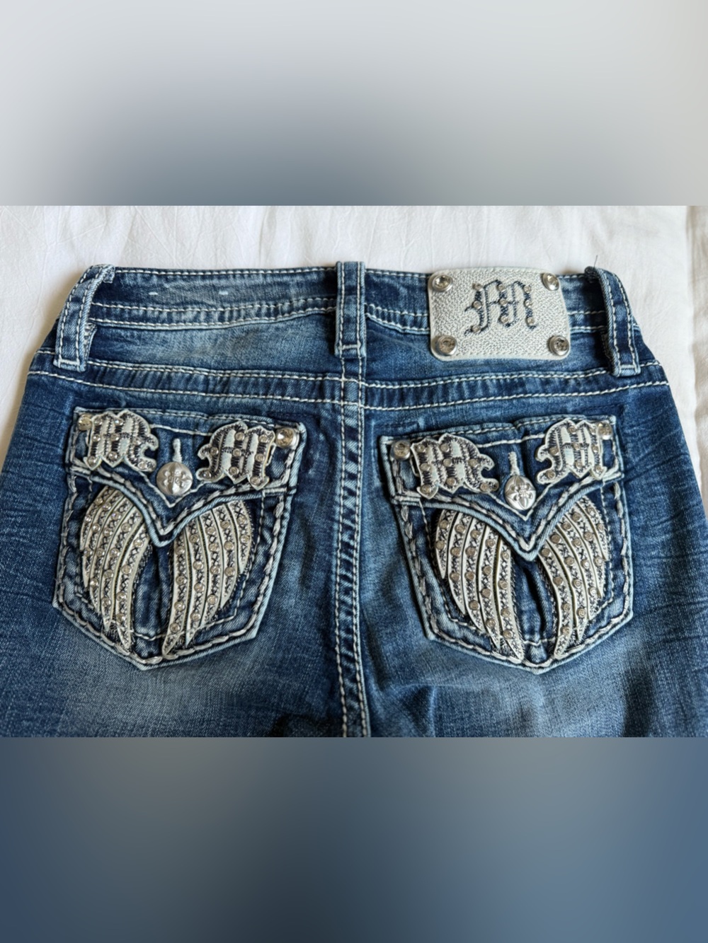 Miss Me Dark Blue Rhinestone Wing Pocket Boot Cut Jeans